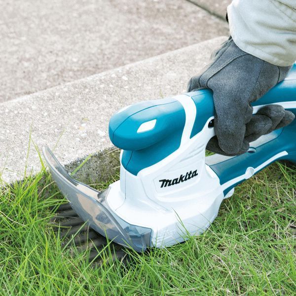 Акумуляторні садові ножиці Makita UM110DWYX UM110DWYX фото