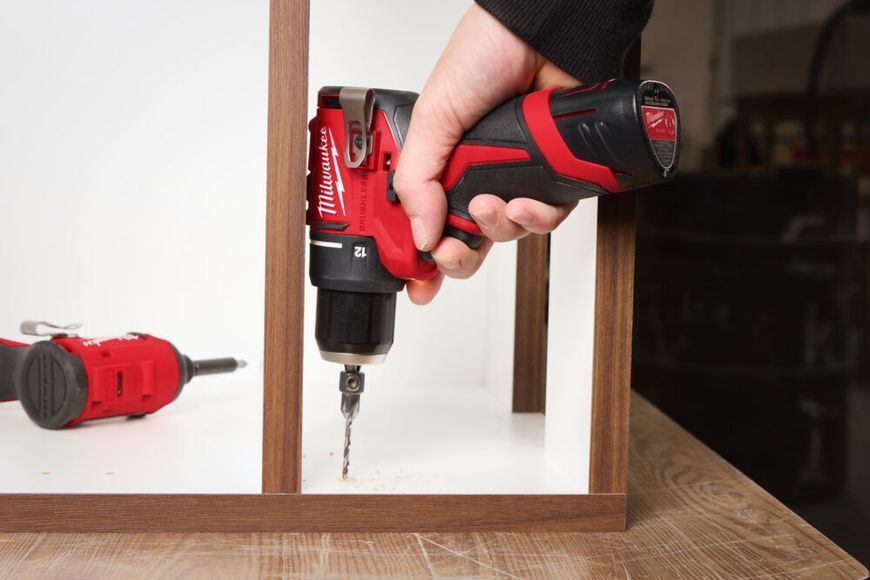Дриль-шурупокрут акумуляторний MILWAUKEE M12 BLDDRC-202C (40Нм) (ЗП+ 2ак.Х2Аг+ кейс) 4933499686 фото